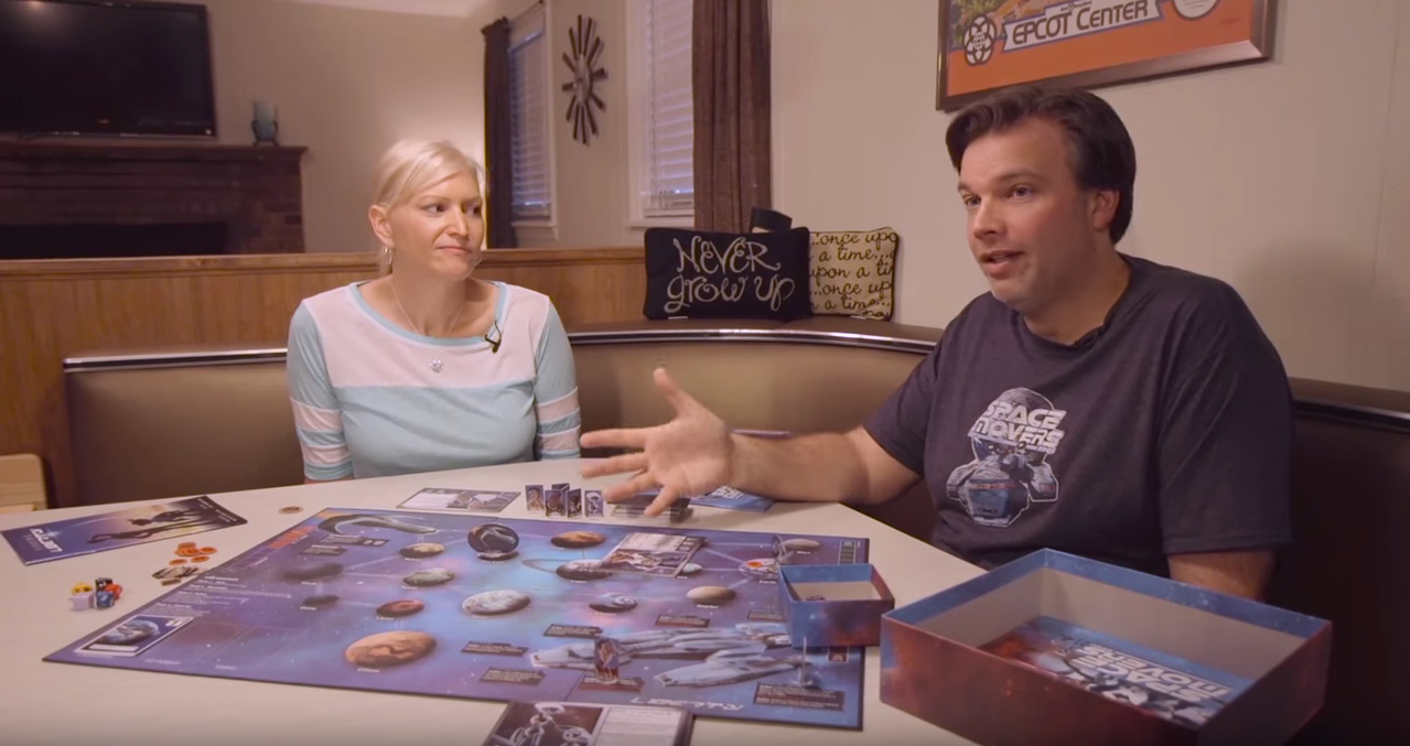 April and Kevin sitting in front of board game
