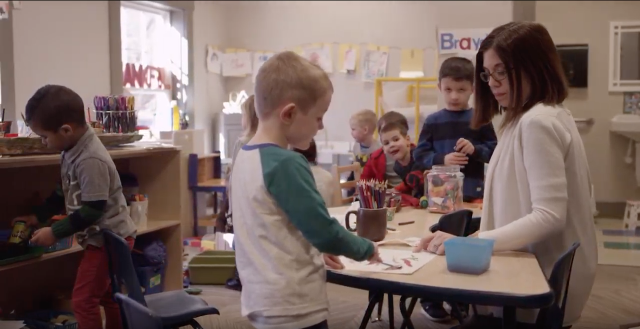 kids coloring a playing
