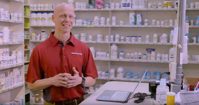 Ryan Hoskins standing at drug store counter