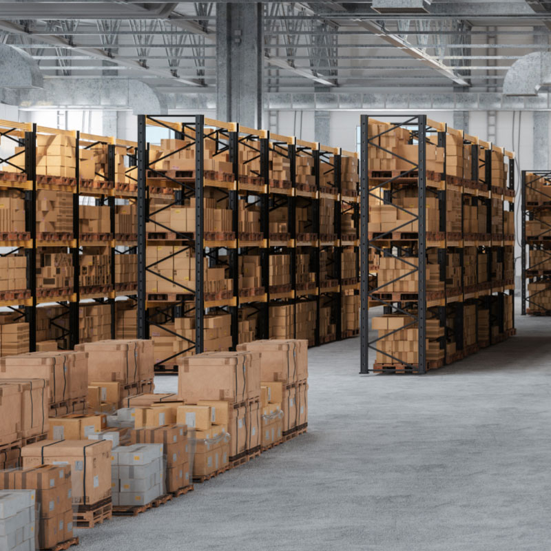 Business inventory in boxes on shelves in a warehouse.