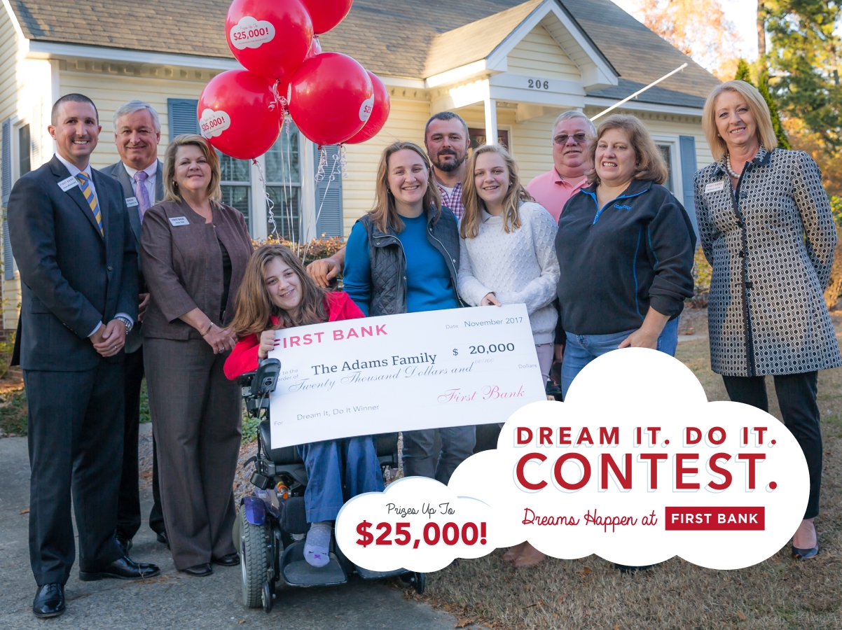 First Bank members awarding check to Dream It Do It contest winners.