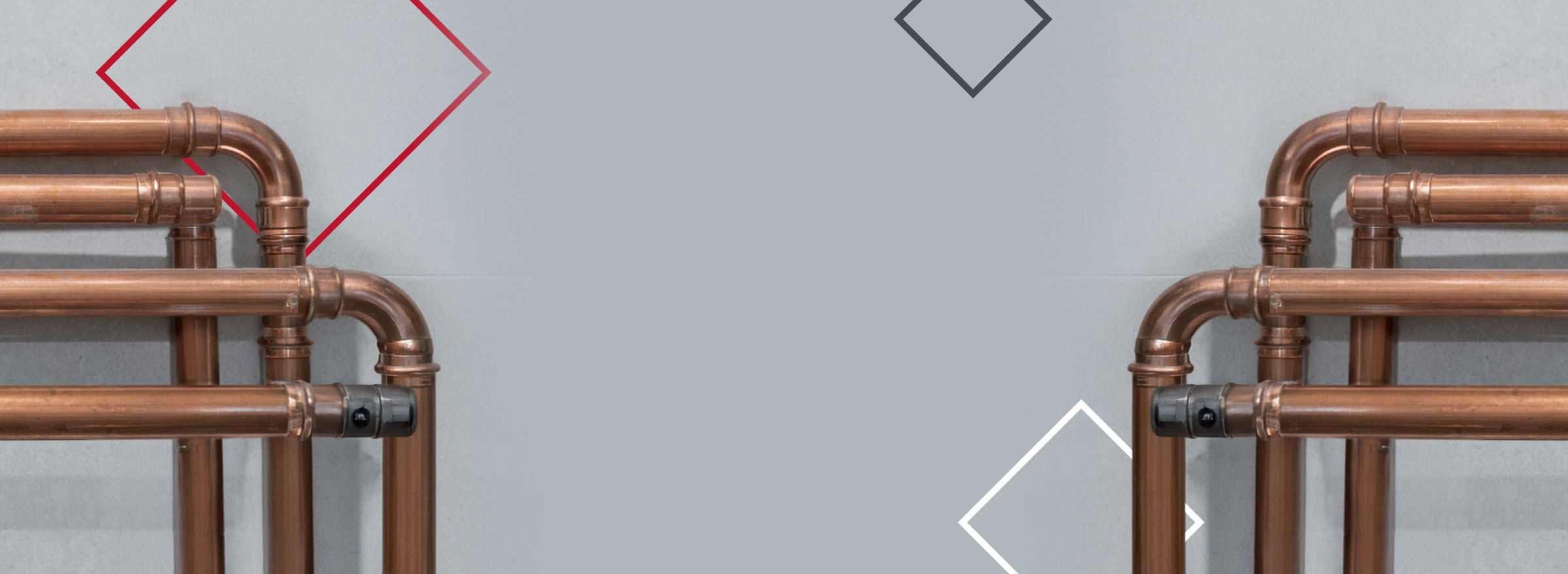 Curved pipes on a gray background.